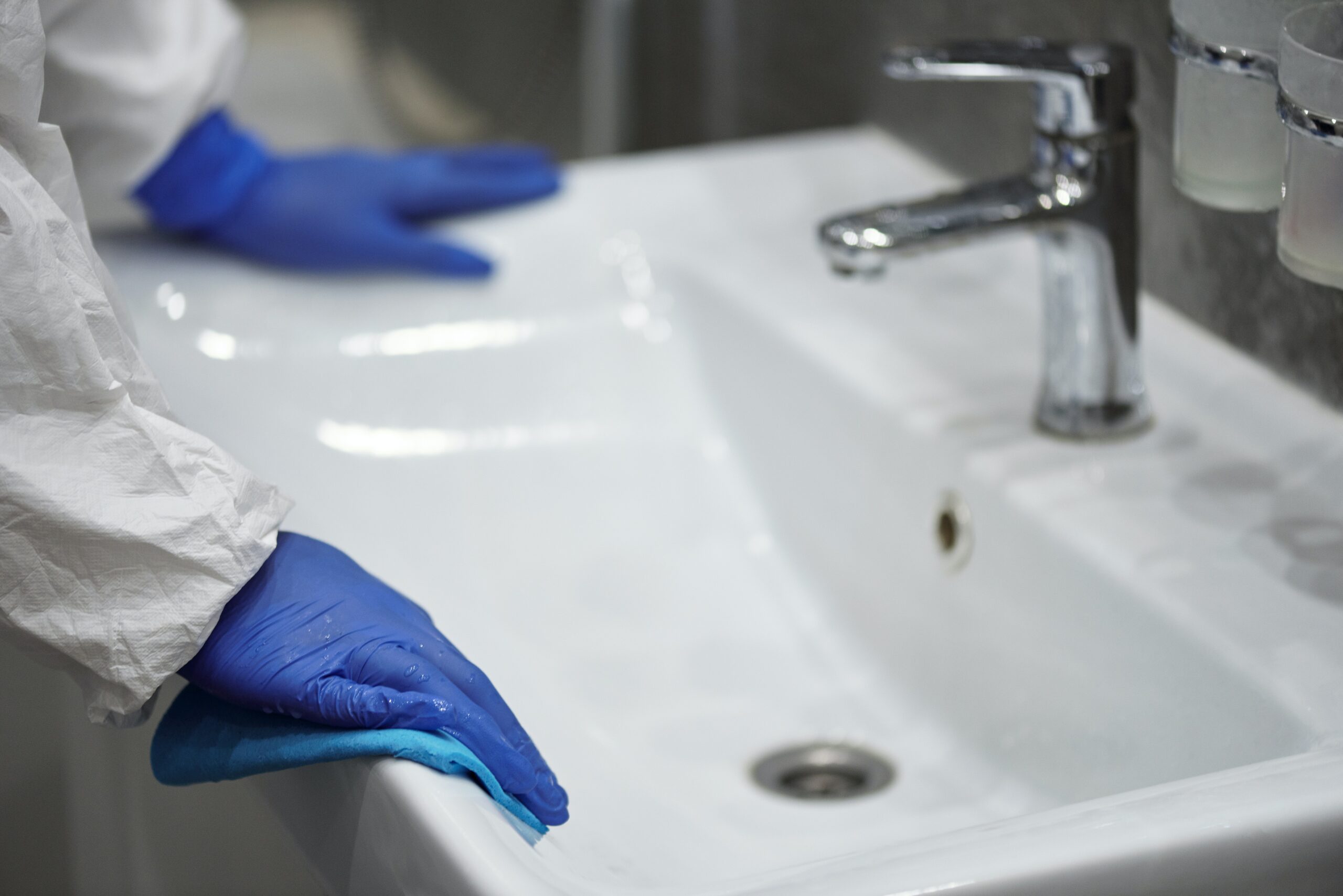 a plumber hands and a tap
