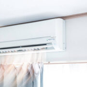 Air conditioner blowing warm air