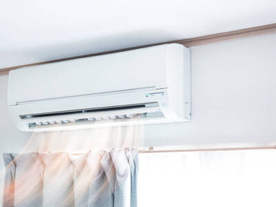Air conditioner blowing warm air